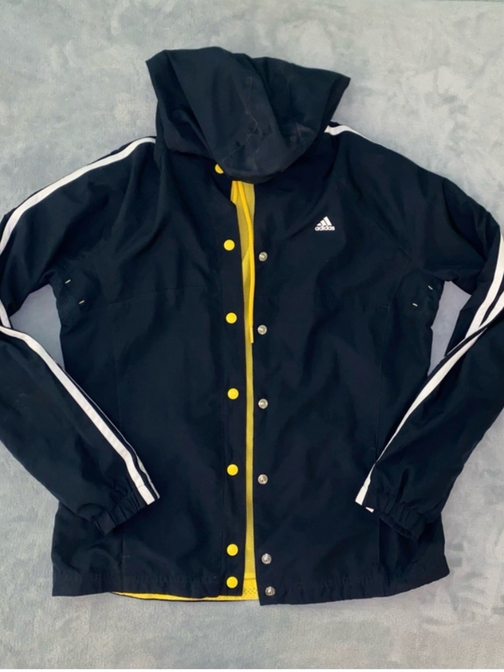 Adidas Black Jacket with White Stripes and Yellow Trim